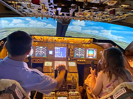 Girl in the simulator Boeing 747