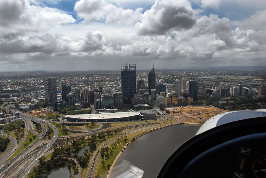 Scenic flight over Perth water overlooking centre of the city